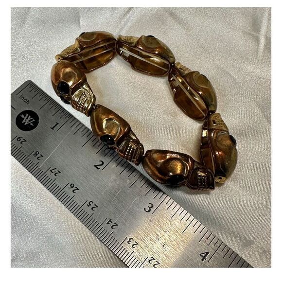 Gold tone and black stretchy skull bracelet - Picture 8 of 8